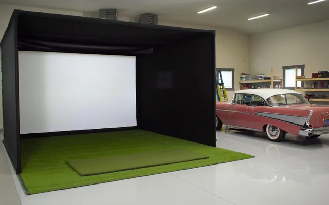 Garage converted to a golf simulator bay