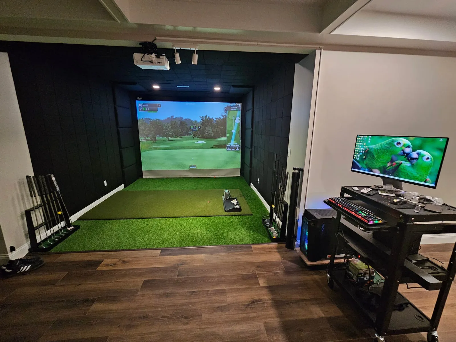 Home golf simulator room with built-in club storage, built for a Liberty, Missouri home