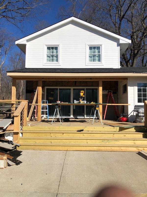 Bare prefab metal shed dropped on a property with no power, insulation, or climate control